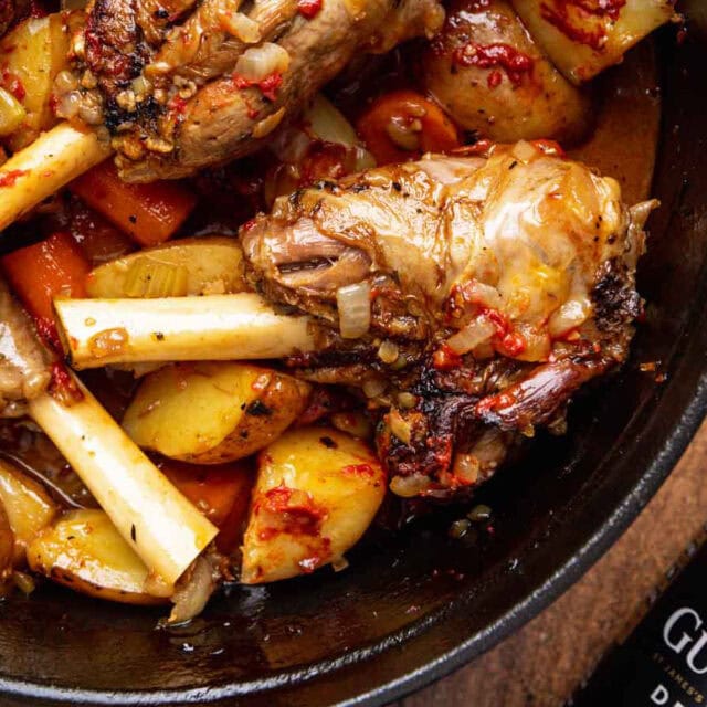 Meaty shank in dutch oven with vegetables.