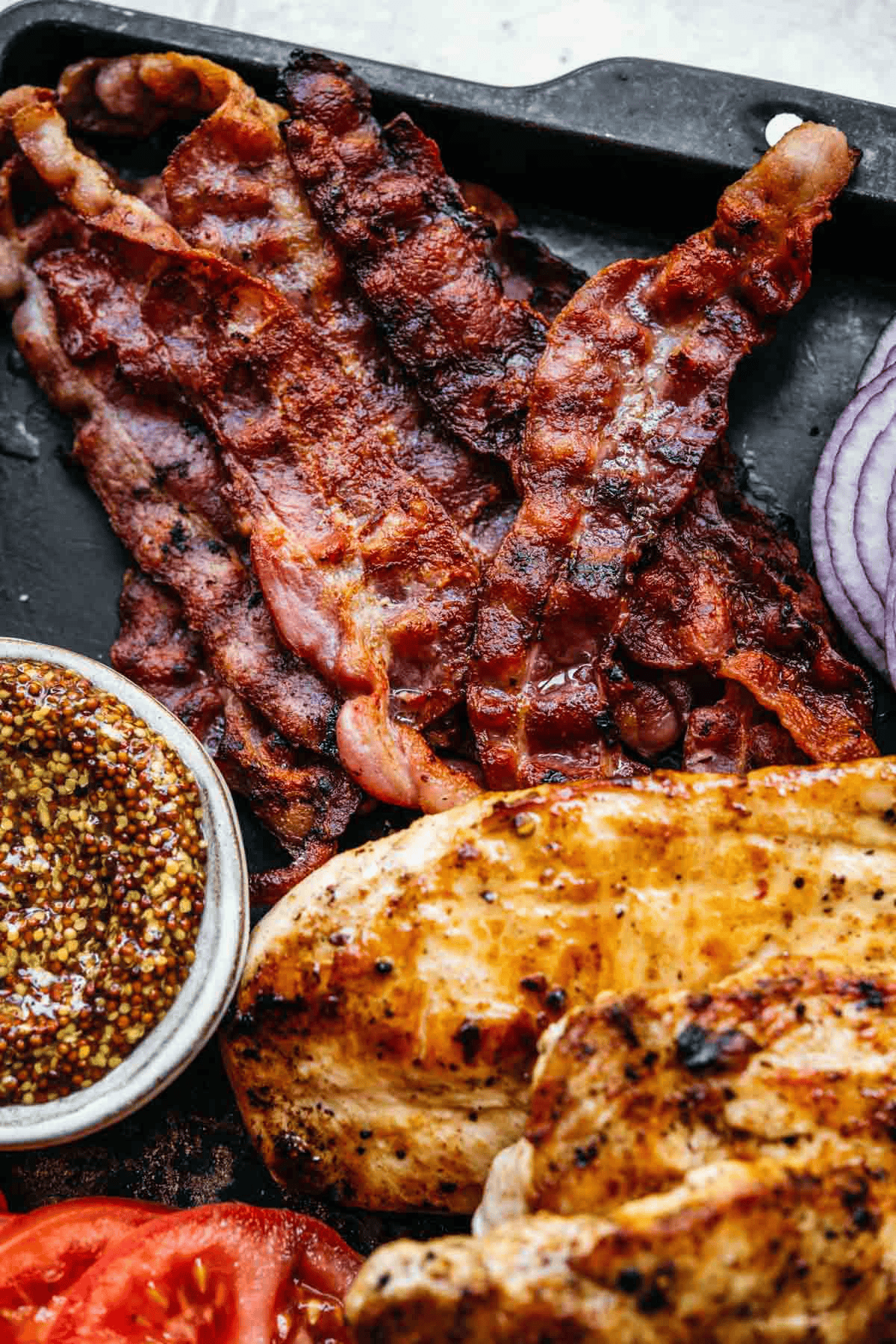 Cooked bacon, chicken and ground mustard