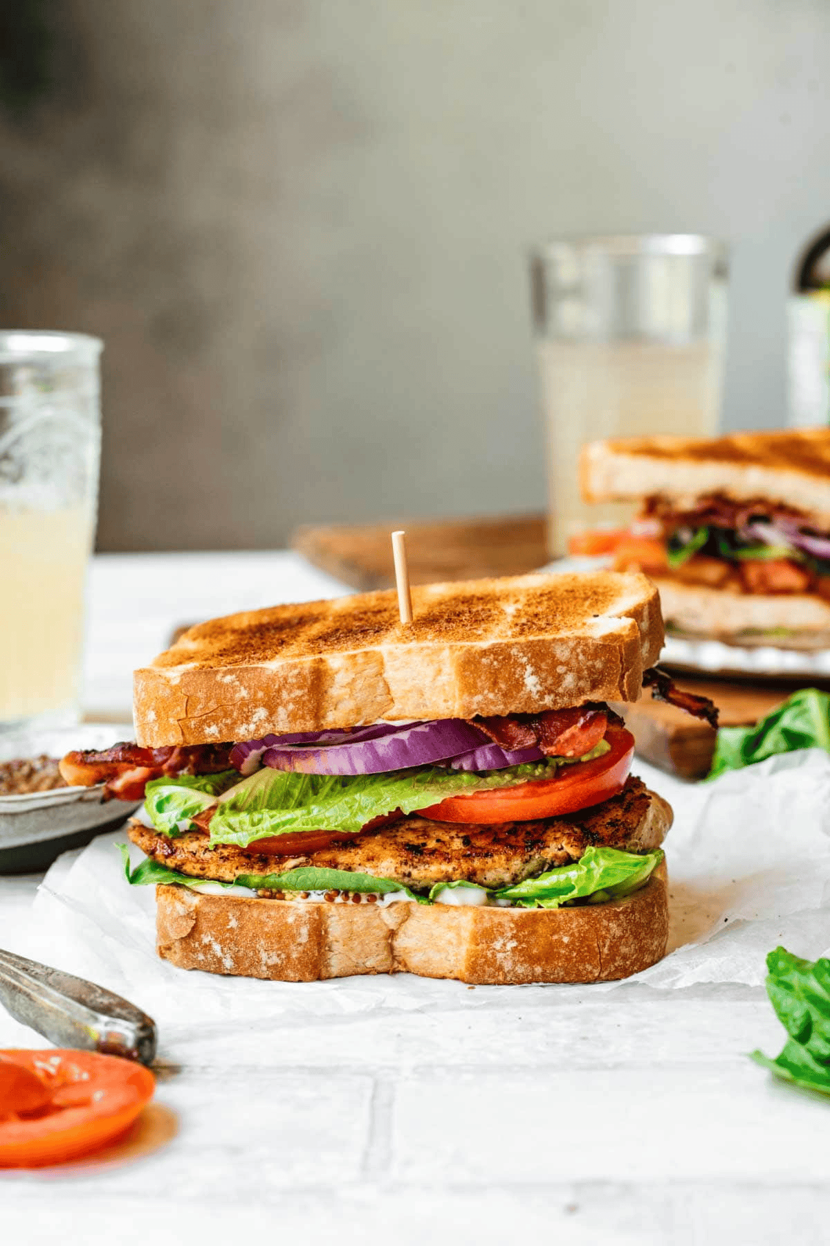 Assembled chicken sandwich with a toothpick in the top