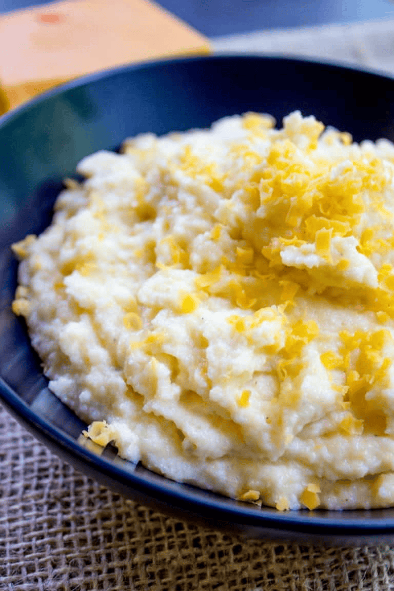 View of polenta topped with shredded cheese