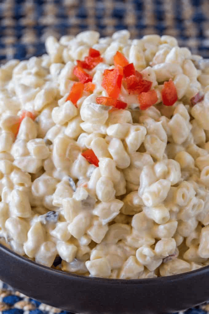 Pasta salad topped with bell pepper