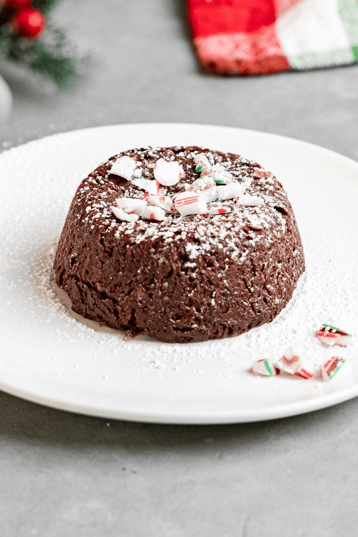 Mini chocolate cake topped in crushed peppermint