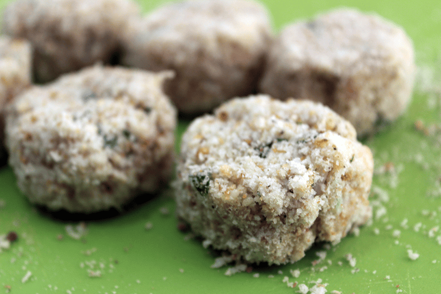 Raw crab mixture formed into cakes