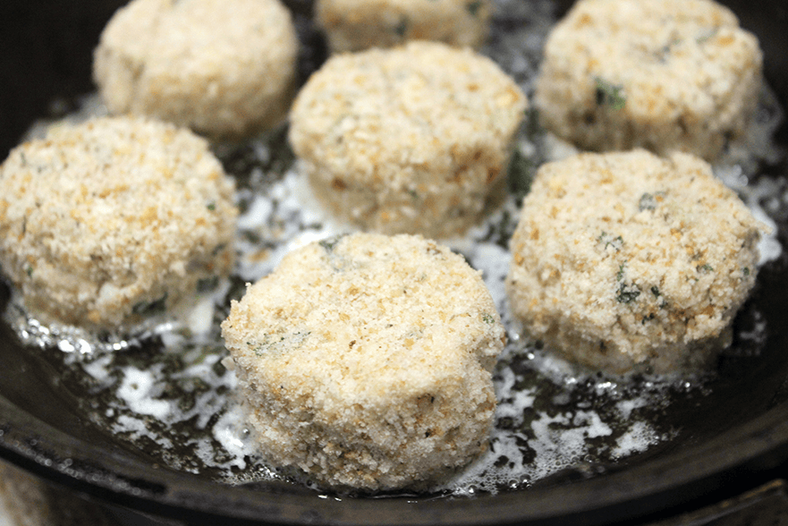 Frying crabcakes in a pan