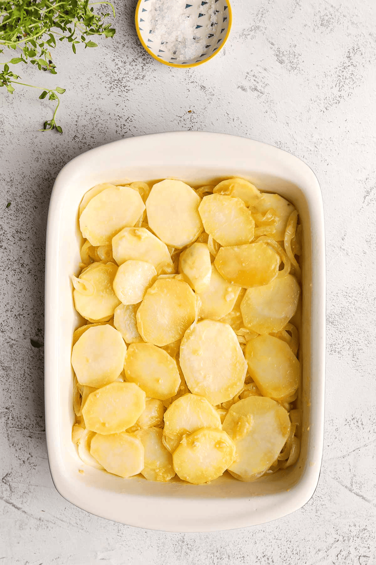 Potato slices in a baking dish