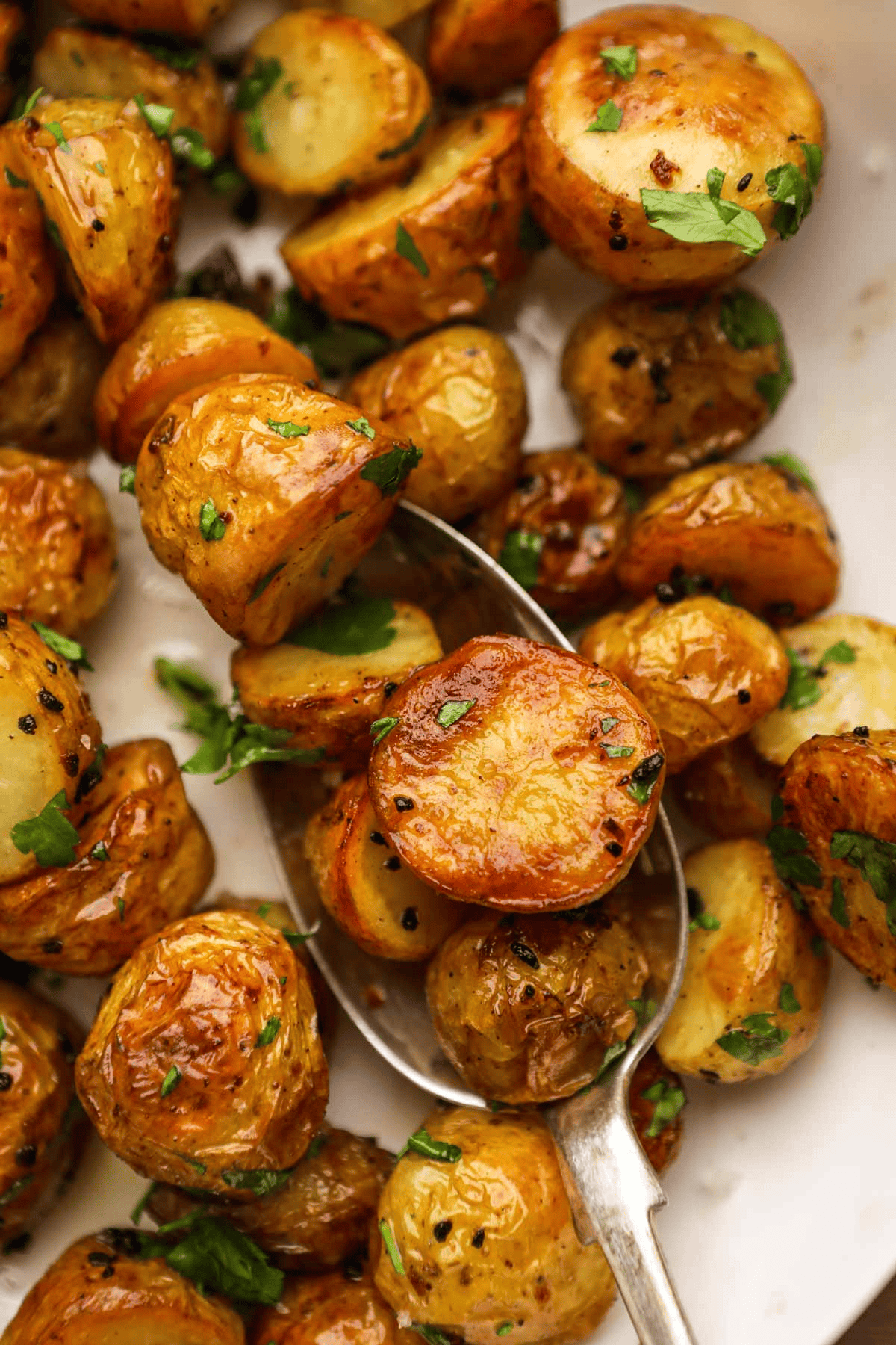 Baby potatoes on a spoon ready to serve