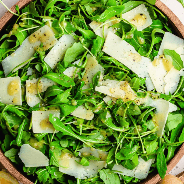 Prepared salad in a wood bowl.