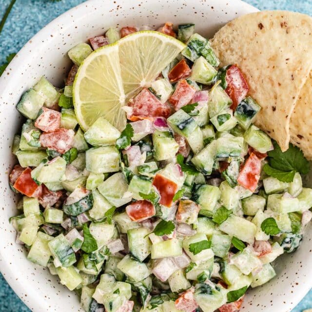 Bowl of creamy salsa with tortilla chips.