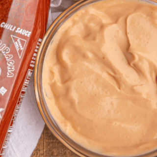 Mayo in clear bowl with siracha