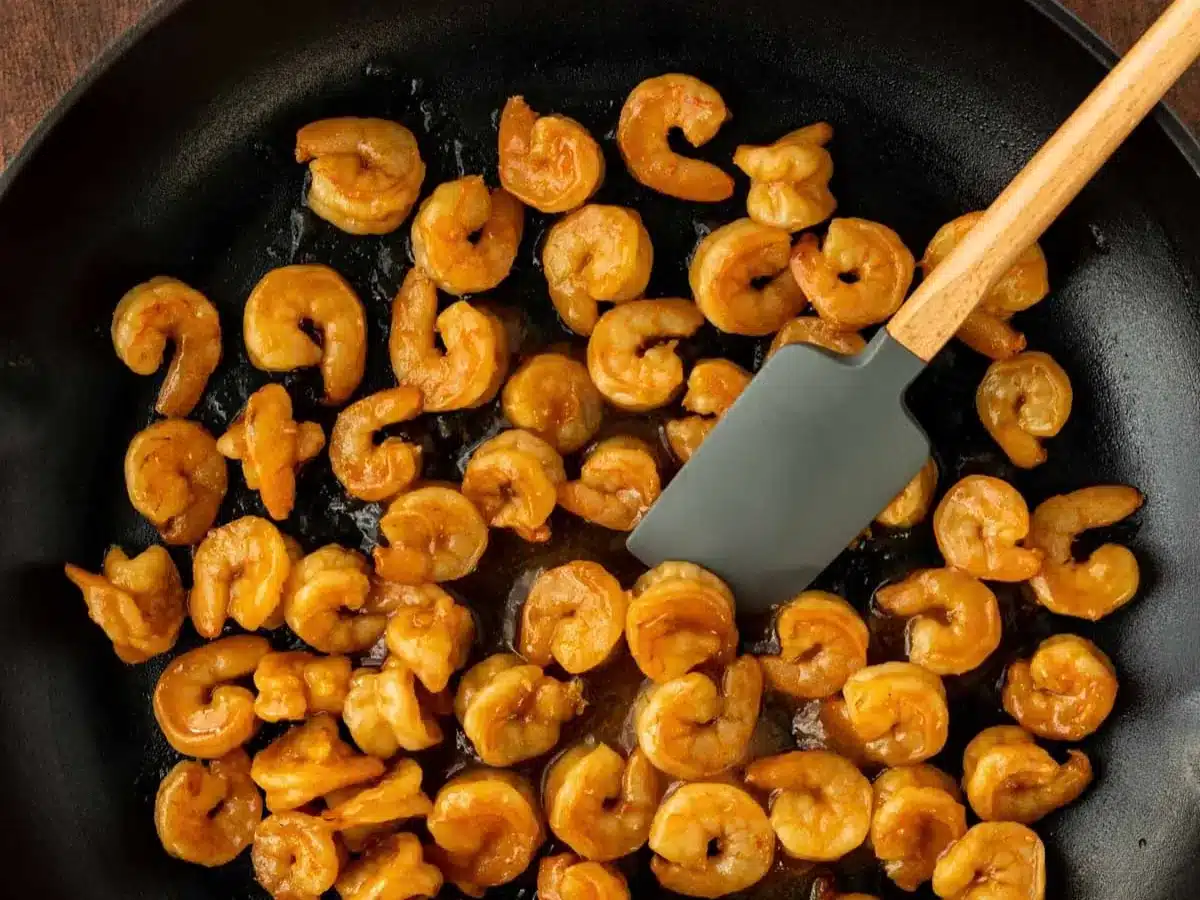 Cooked shrimp in frying pan.