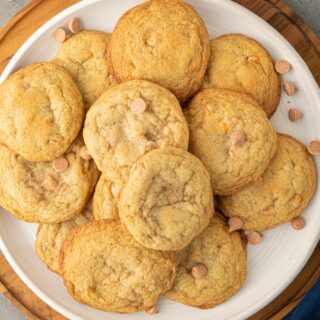 Plate full of baked cookies.