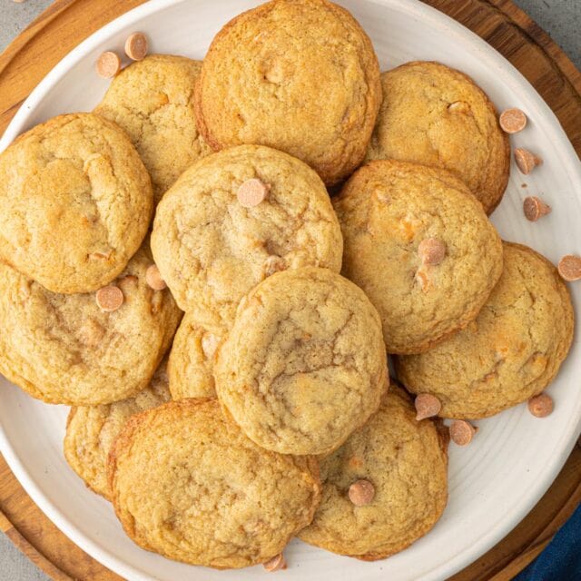 Plate full of baked cookies.