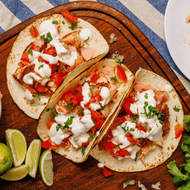 Assembled tacos with sauces and toppings