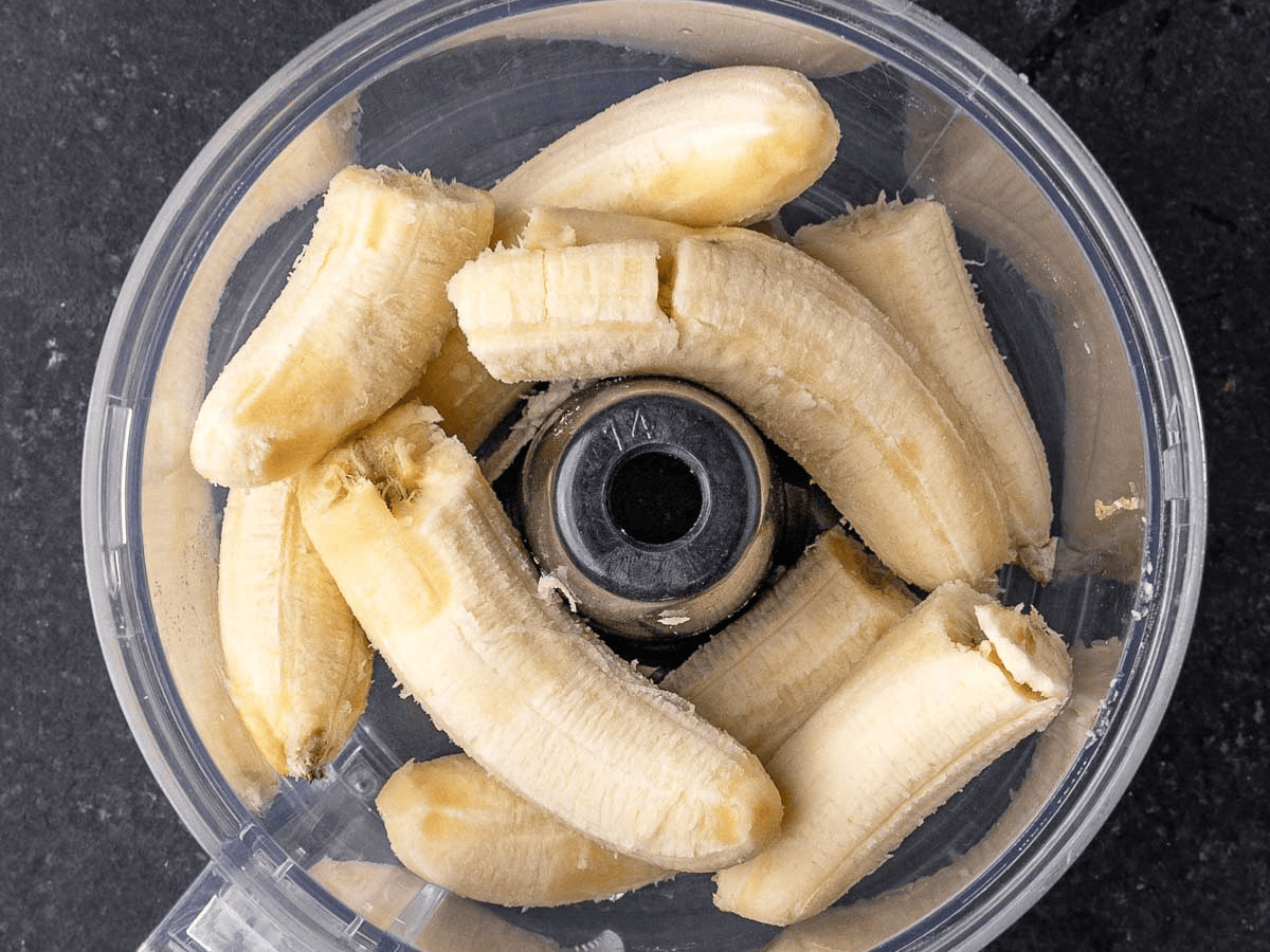 Pieces of banana in food processor.