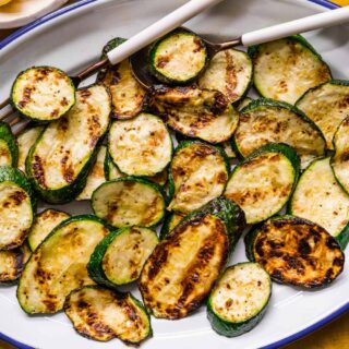Grilled squash on serving dish.