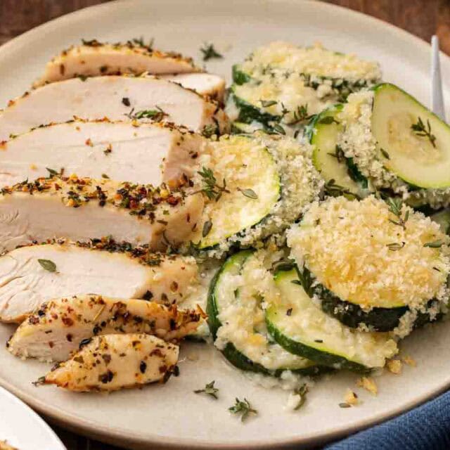 Dinner plate with vegetable casserole and chicken breast.