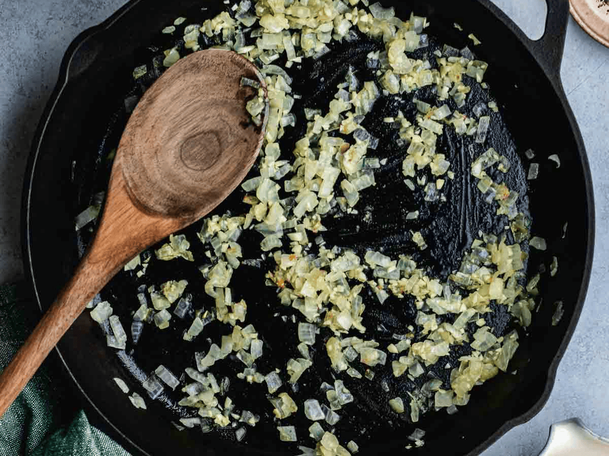 Garlic and onion sautéing in pan.