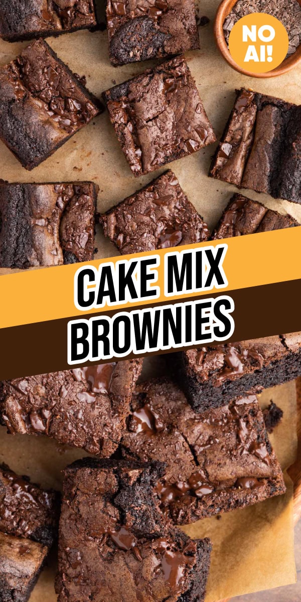 Chocolate brownie squares scattered on parchment paper.