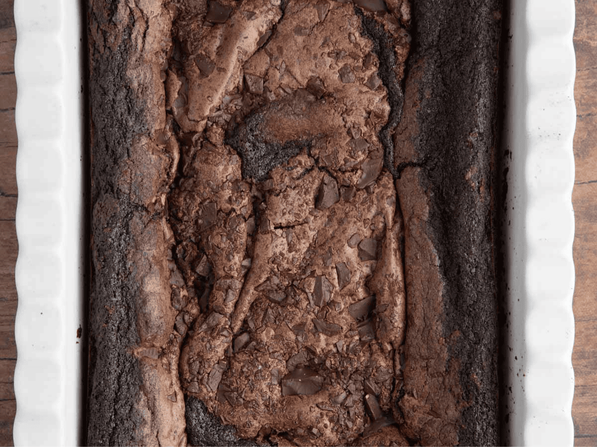 Baked, uncut brownies in pan.