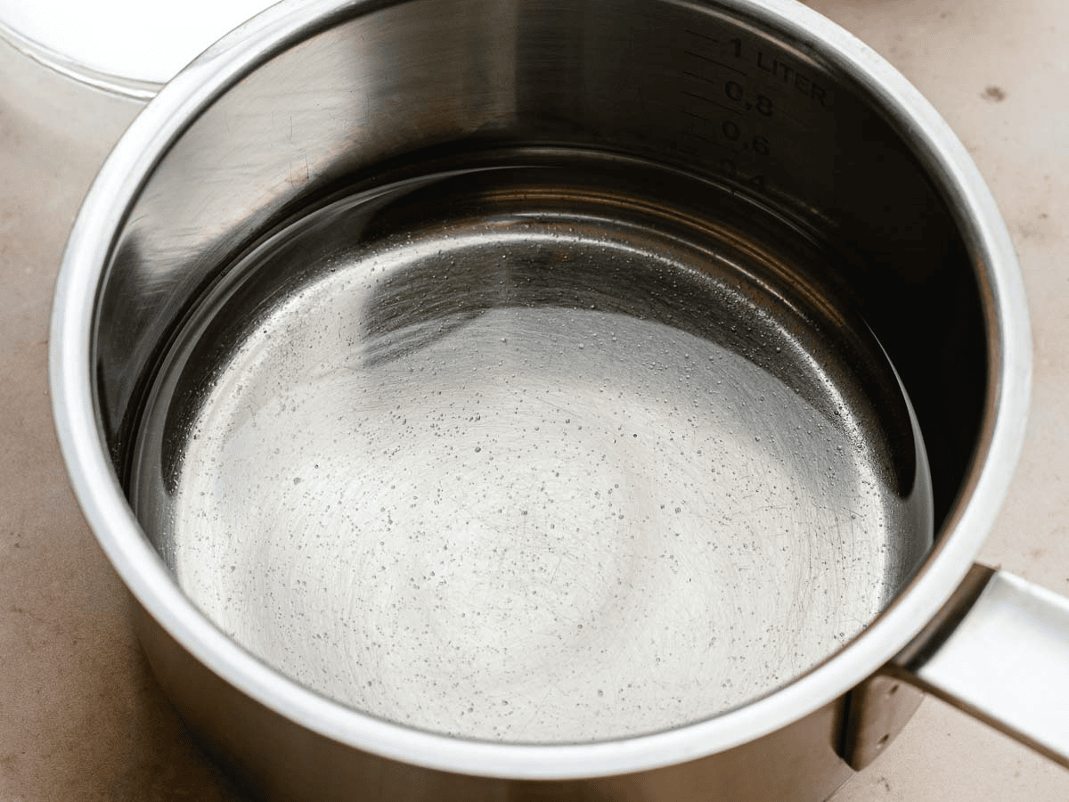 Melted sugar in a silver pan.