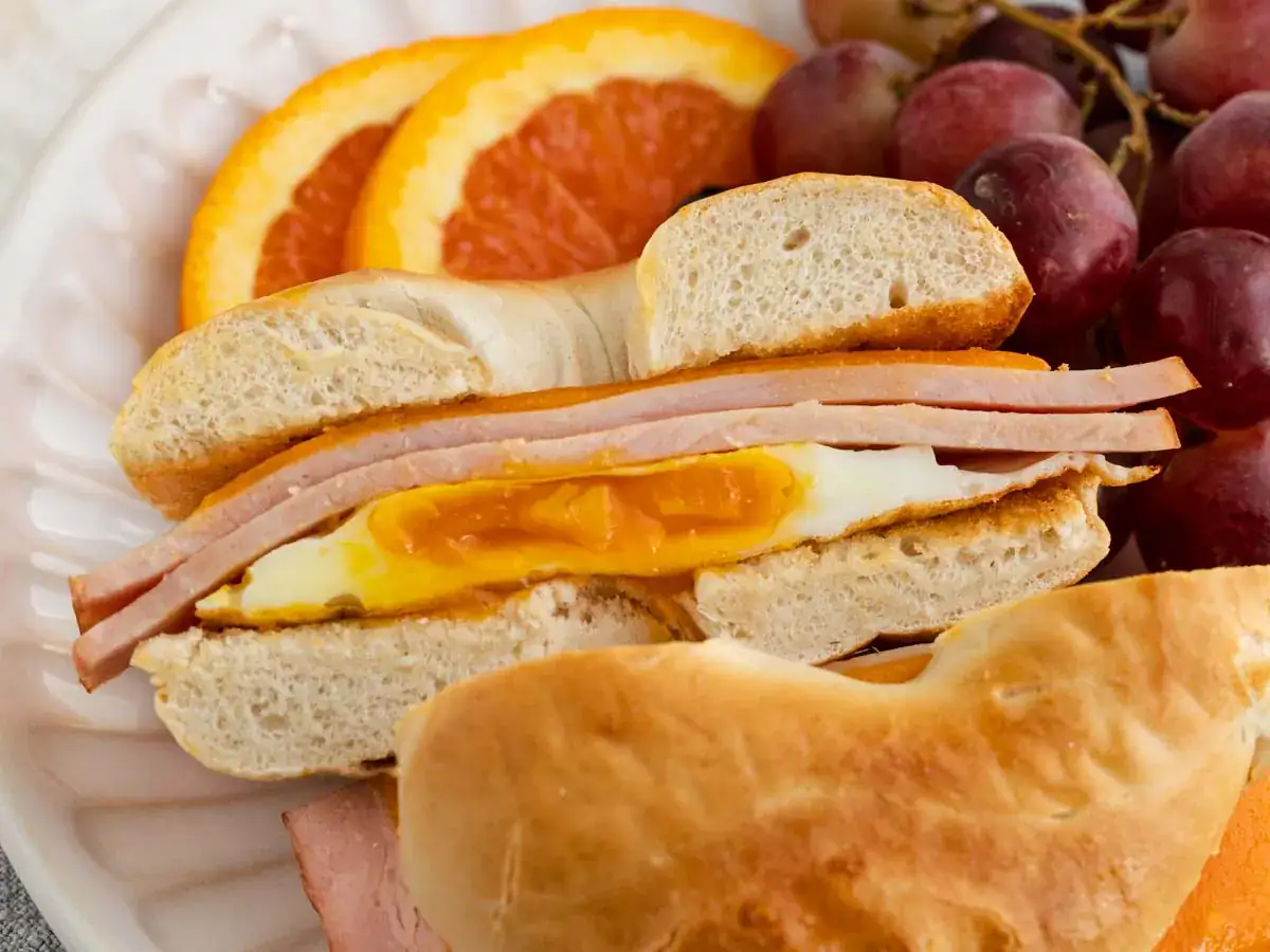 Breakfast sandwich with ham, egg, and cheese.