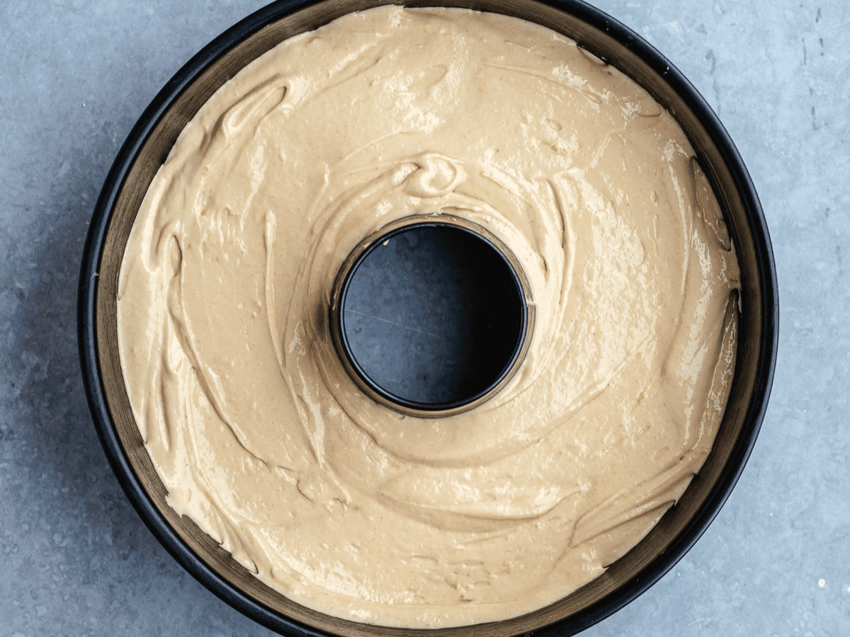 Cake batter in cake pan.