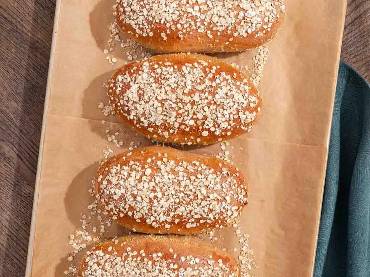 Freshly baked loaves with oatmeal on top.