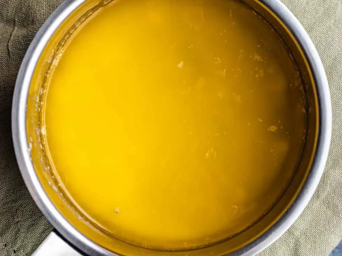 Melted butter in pan.