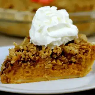 slice of pie topped with whipped cream