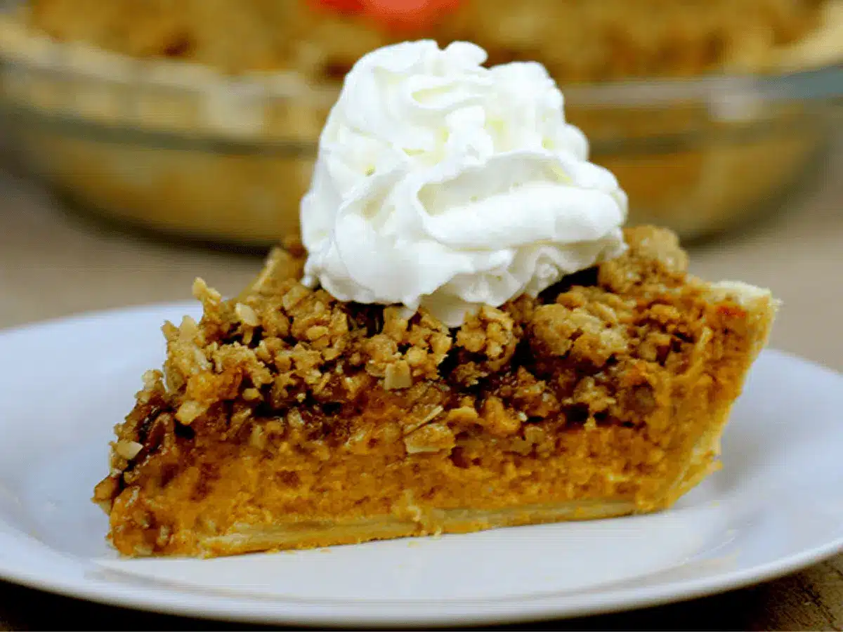 slice of pie topped with whipped cream