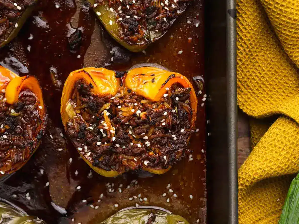 Stuffed veggies cooked on baking tray.