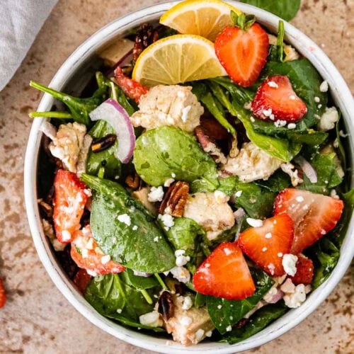Strawberry Spinach Salad in small white bowl.